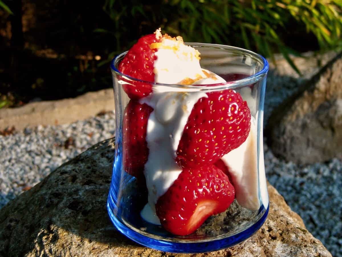 Served in a wobbly blue sake glass, fresh local strawberries are drenched in Golden Sake Sauce and garnished with lemon zest and brown sugar.