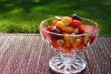 Sangria Fruit Salad served in a cut glass compote.