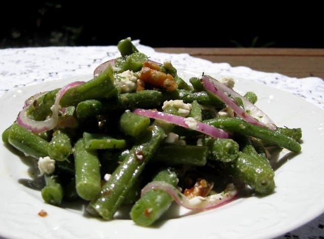 Green Bean Walnut and Feta Salad on a white plate