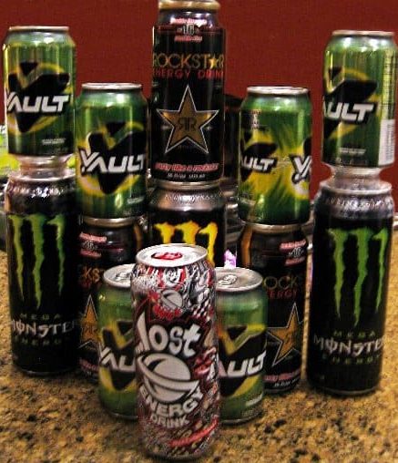 A tower of energy drinks stacked on my kitchen counter.
