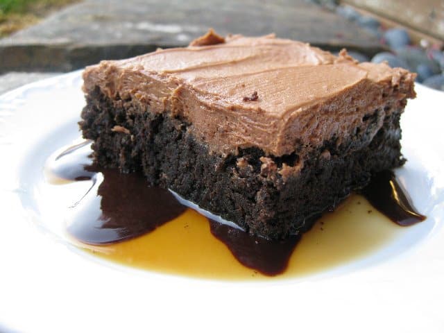 Fire Brownie with a splash of Kahlua on a plate
