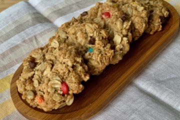 Soul-Stirring Oatmeal Cookies arranged on a wooden plate.