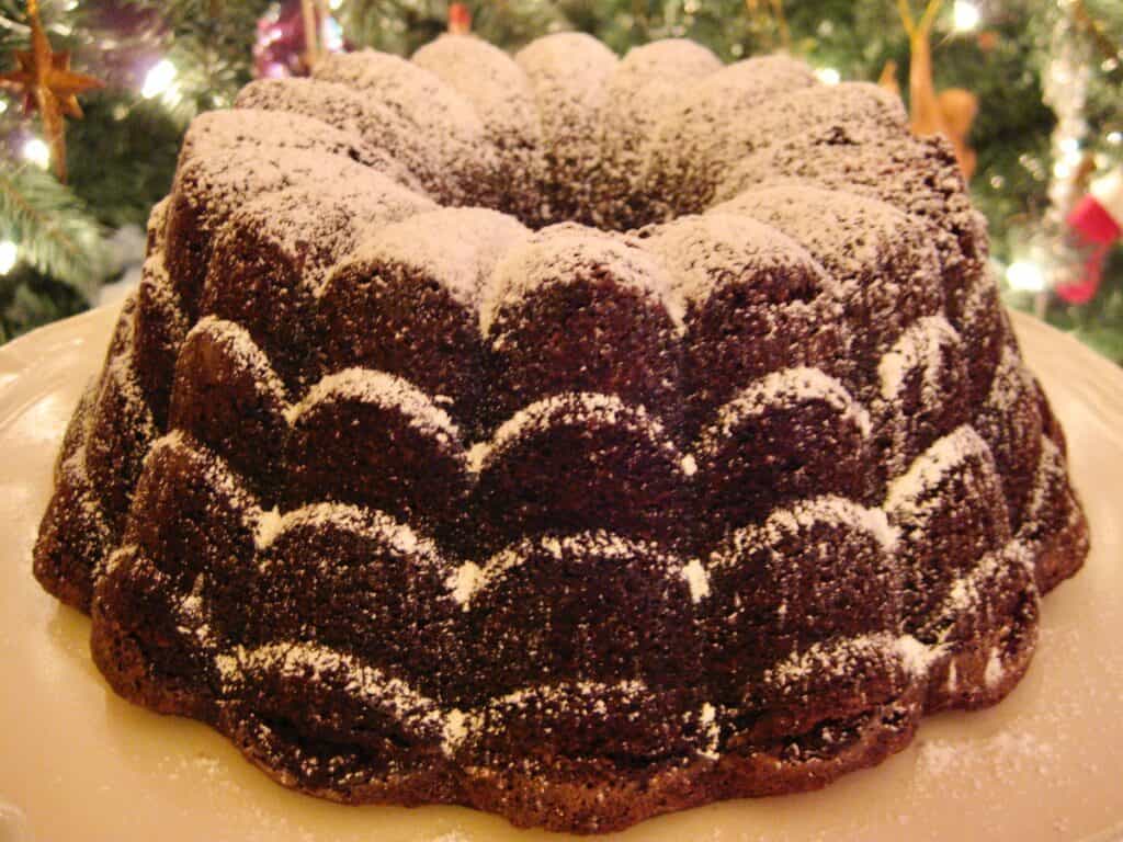 A Bourbon Chocolate Bundt Cake dusted with powdered sugar.