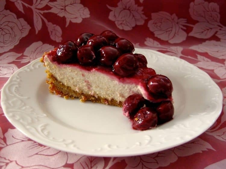 A slice of Cherry Cheese Pie with Morello Cherry Topping.