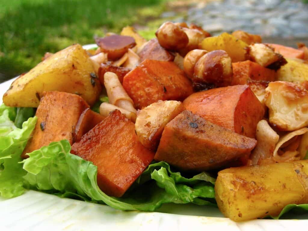 Roasted Sweet Potatoes and Pineapple with Macadamia Nuts and strips of ham.