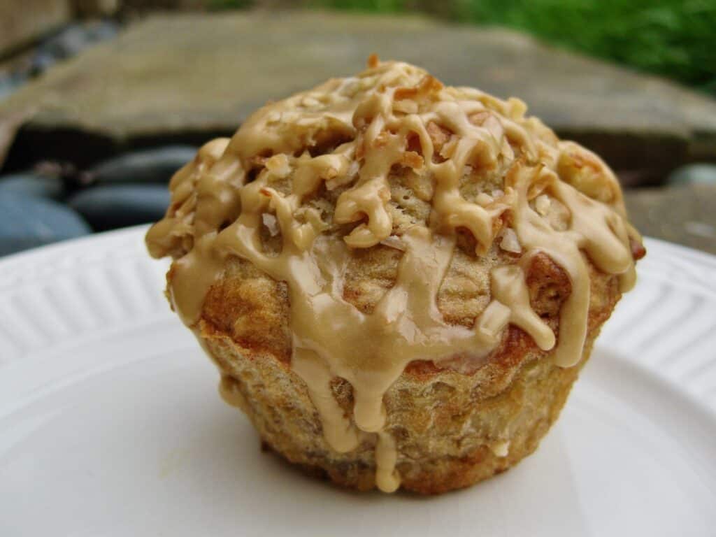 A Java Monkey Muffin topped with Espresso Glaze elevates the appeal of banana muffins.