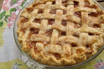 Cousin Alvin's Rhubarb Cream Pie with a golden lattice top crust.