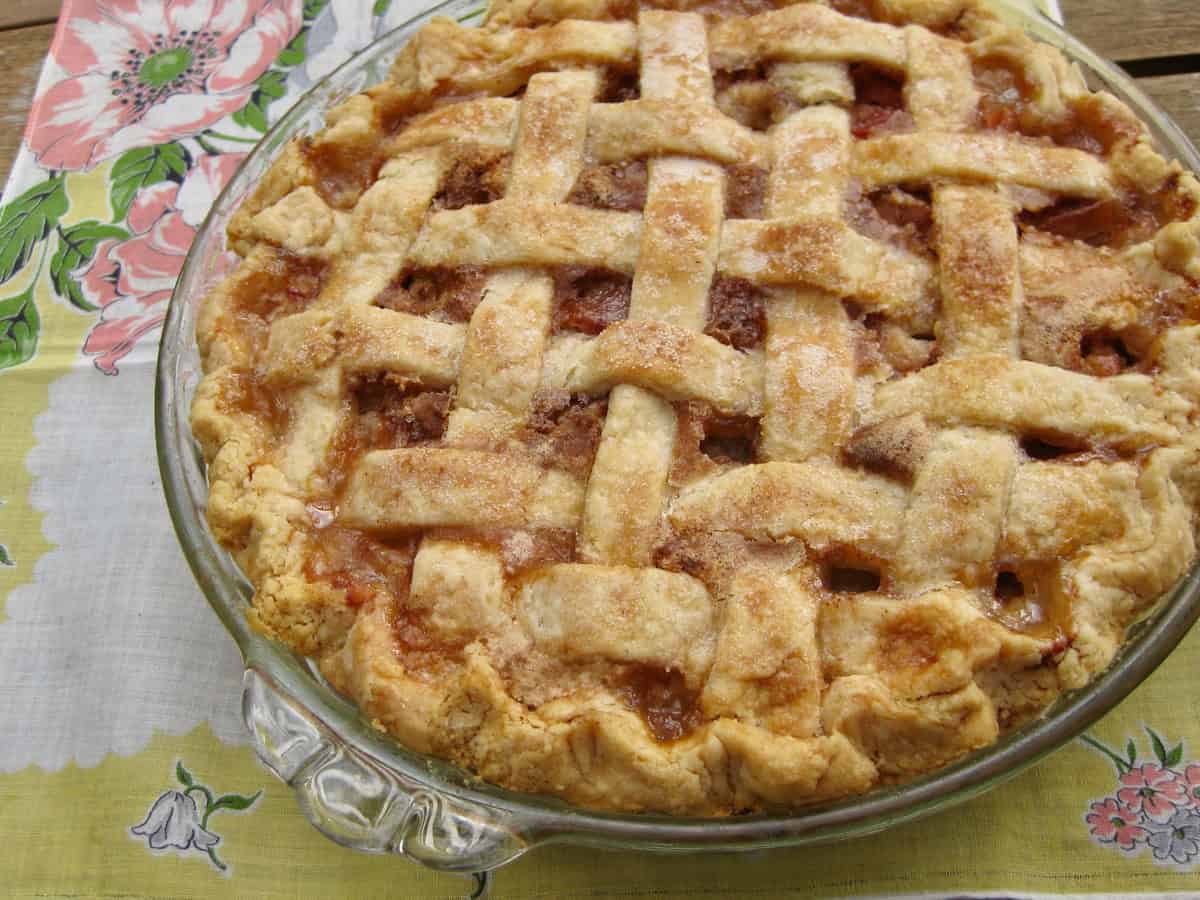 Cousin Alvin's Rhubarb Cream Pie with a golden lattice top crust.