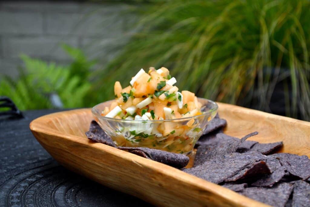 Ripe cantaloupe pairs with jicama, a Serrano pepper and lime juice in this Cantaloupe Salsa. Serve with crispy corn tortilla chips.