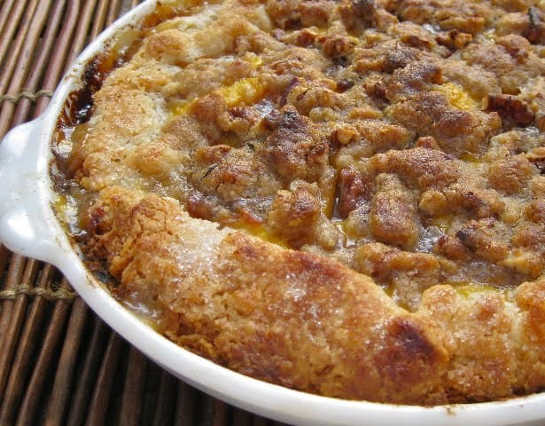 Streusel Topped Little Peach Pie in white pie dish