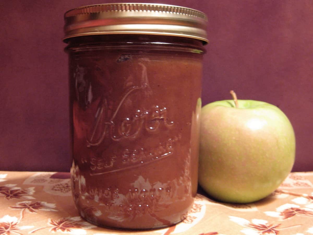 A mason jar filled with Homemade Apple Butter. 