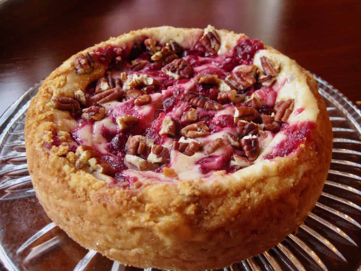 Cranberry Cheesecake Spread on a glass platter without the cranberry sauce topping.