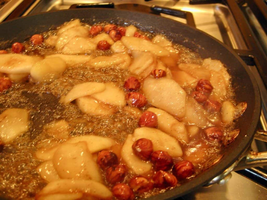Hazelnut Pear Flambe Sauce in a skillet on the stovetop