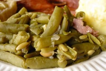A Serving of Southern Style Green Beans with bits of ham.