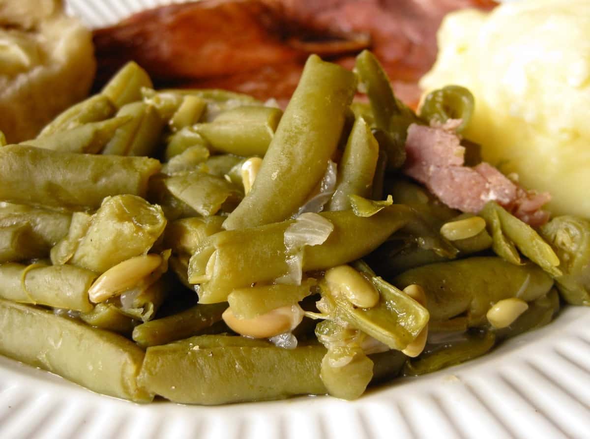 A Serving of Southern Style Green Beans with bits of ham.