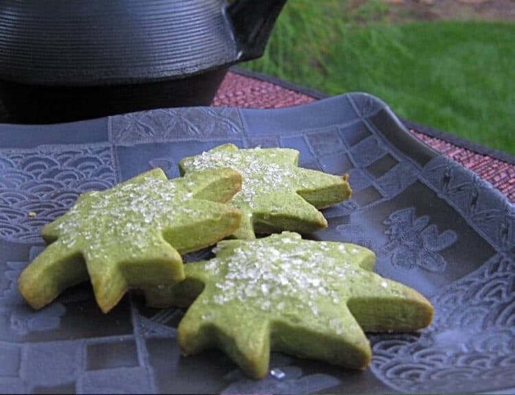 Green Tea Cookies (Matcha Shortbread) served on a square black Japanese plate beside an iron teapot (tetsubin).