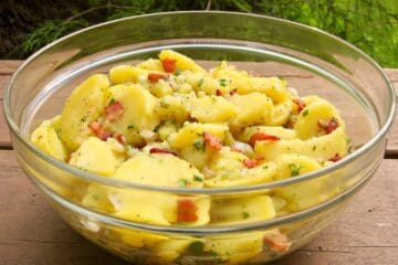 Hot German Potato Salad in a glass bowl.