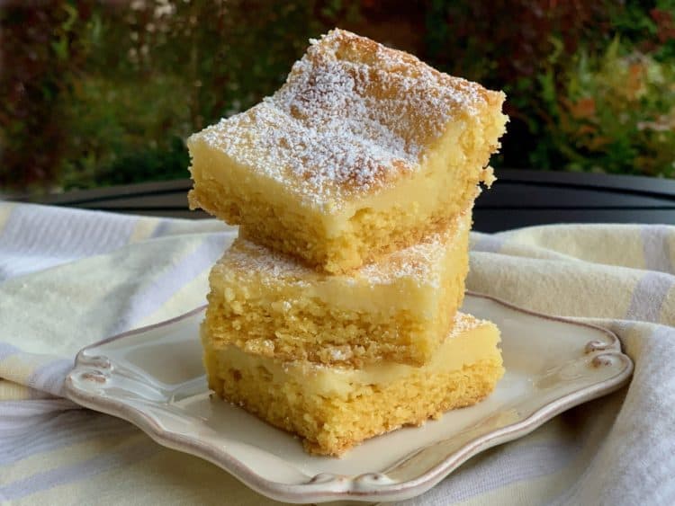 Chess Squares dusted with powdered sugar and stacked on a small plate