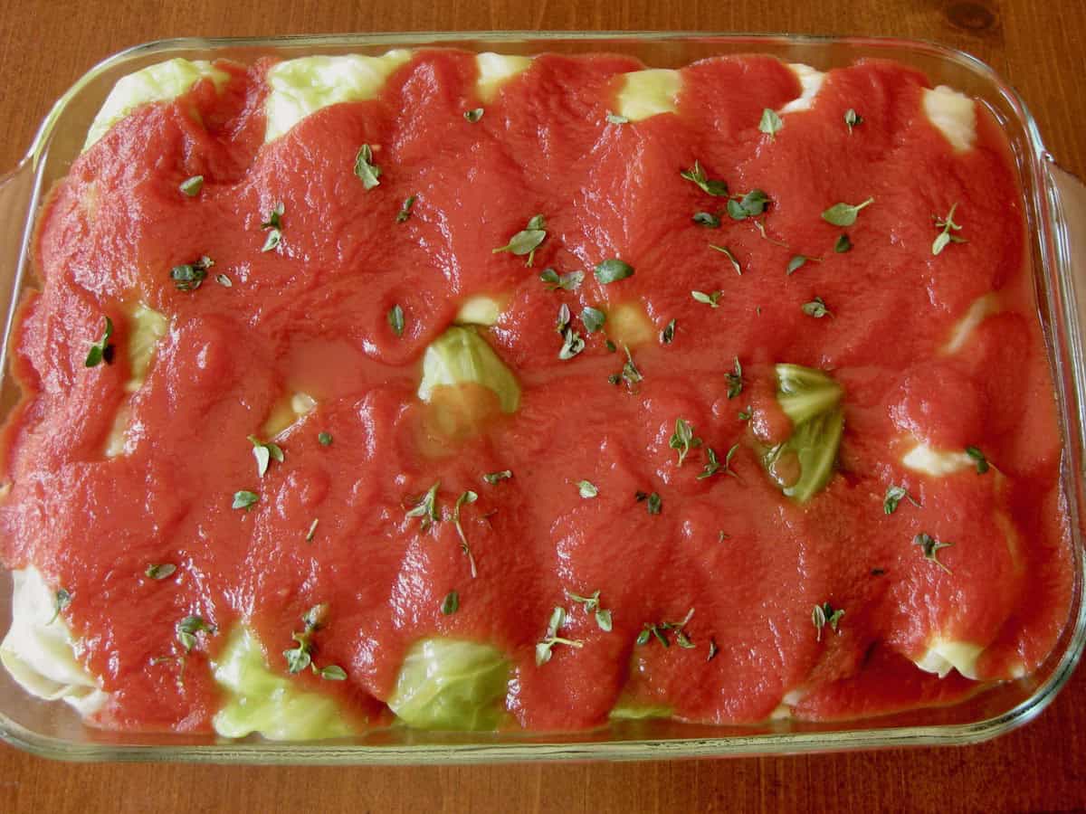 Cabbage Rolls covered with tomato soup or sauce before baking Galumpki.