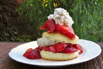 Strawberry Shortcake made with fresh strawberries and Buttermilk Scones topped with Whipped Cream.