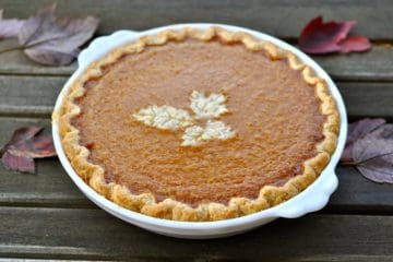 A whole Pumpkin Pie topped with pastry leaves and surrounded by fallen leaves - a great conclusion to our Thanksgiving menu.