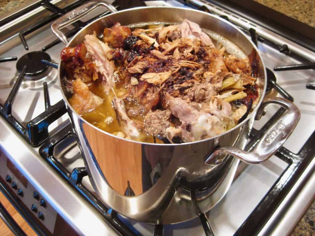 Leftover bits and bones from our Thanksgiving dinner go into a pot to make Turkey Stock. 