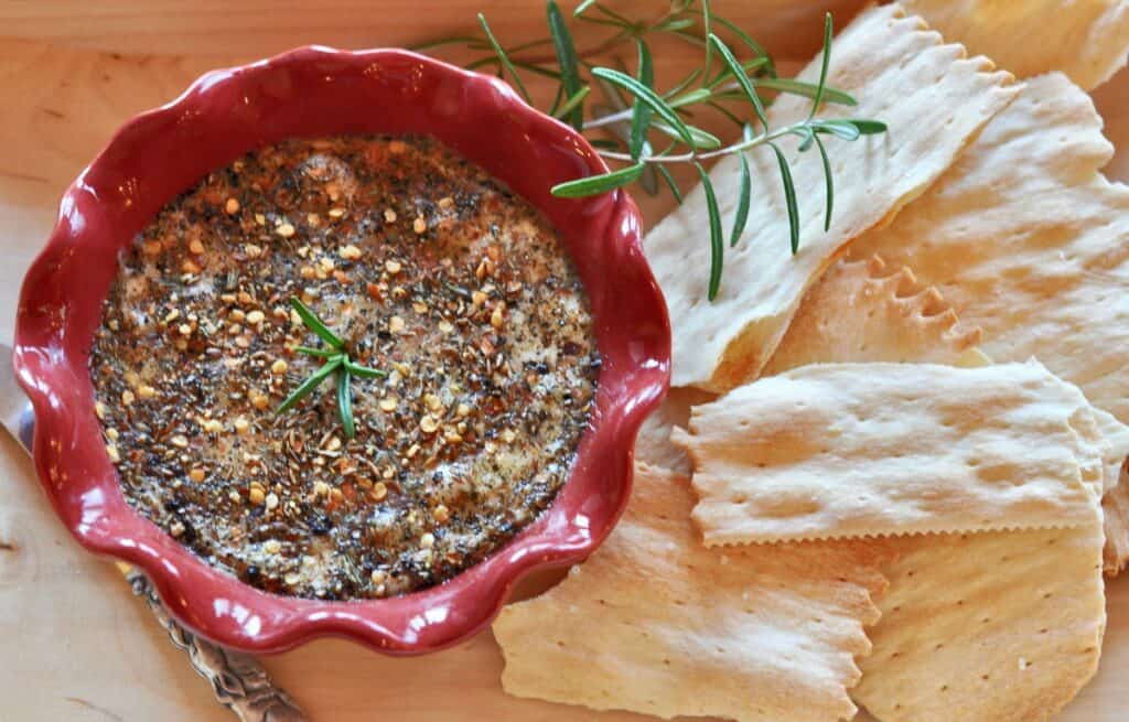 Easy to make, Spicy Hot Brie is topped with herbs and spices and served warm from the oven. 