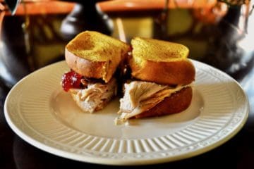 The Best Turkey Sandwich on a white plate.