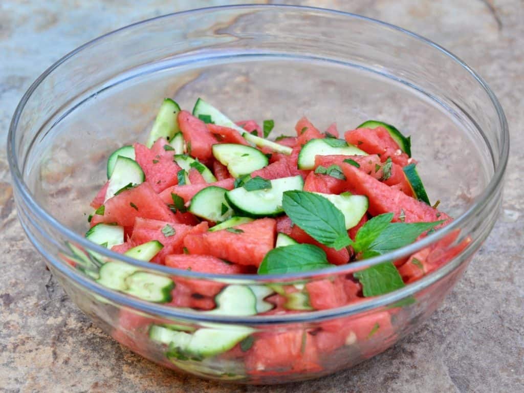 Watermelon Salad with Cucumber and Mint in a glass bowl