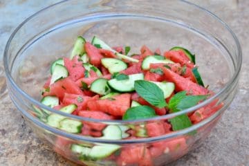 Watermelon Salad with Cucumber and Mint in a glass bowl