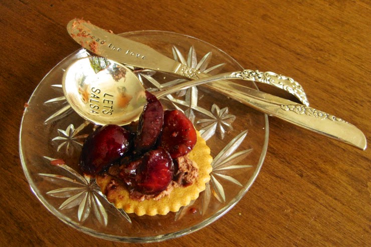 Sweet Cherry Salsa over Spiced Chocolate Cream Cheese Spread on a thin Sugar Cookie for a sweet little dessert nibble.