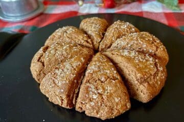 A wheel of Gingerbread Scones sprinkled with coarse sugar.