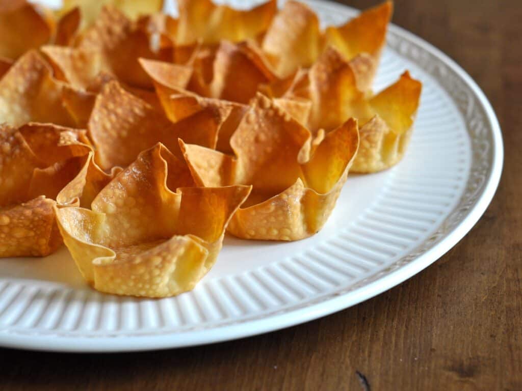 Wonton Cups arranged on a white platter.