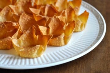 Wonton Cups arranged on a white platter.