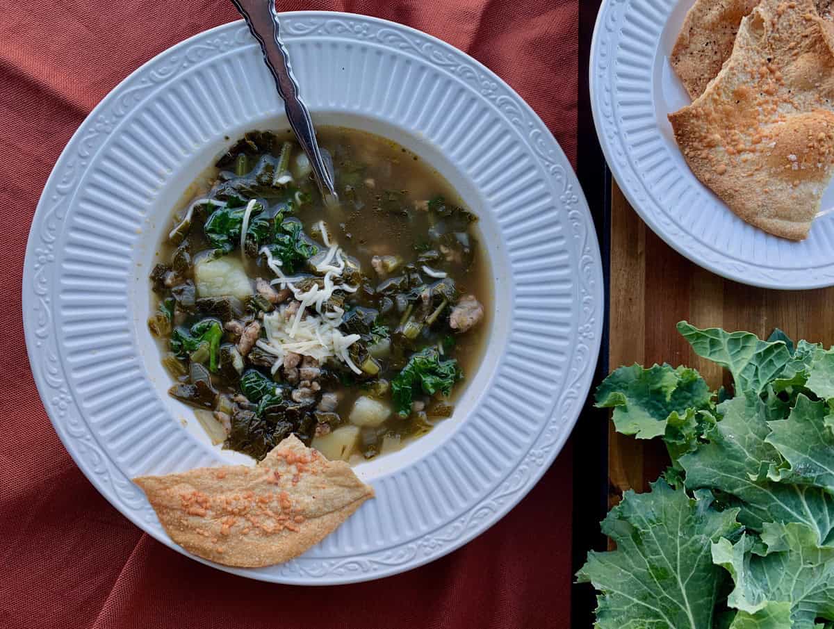 Kale and Potato Soup with Sausage served with Sourdough Cracker Leaves.