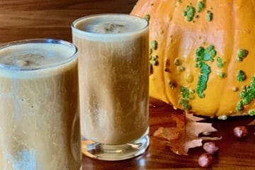 Gingerbread Smoothies in glasses with pumpkin background.