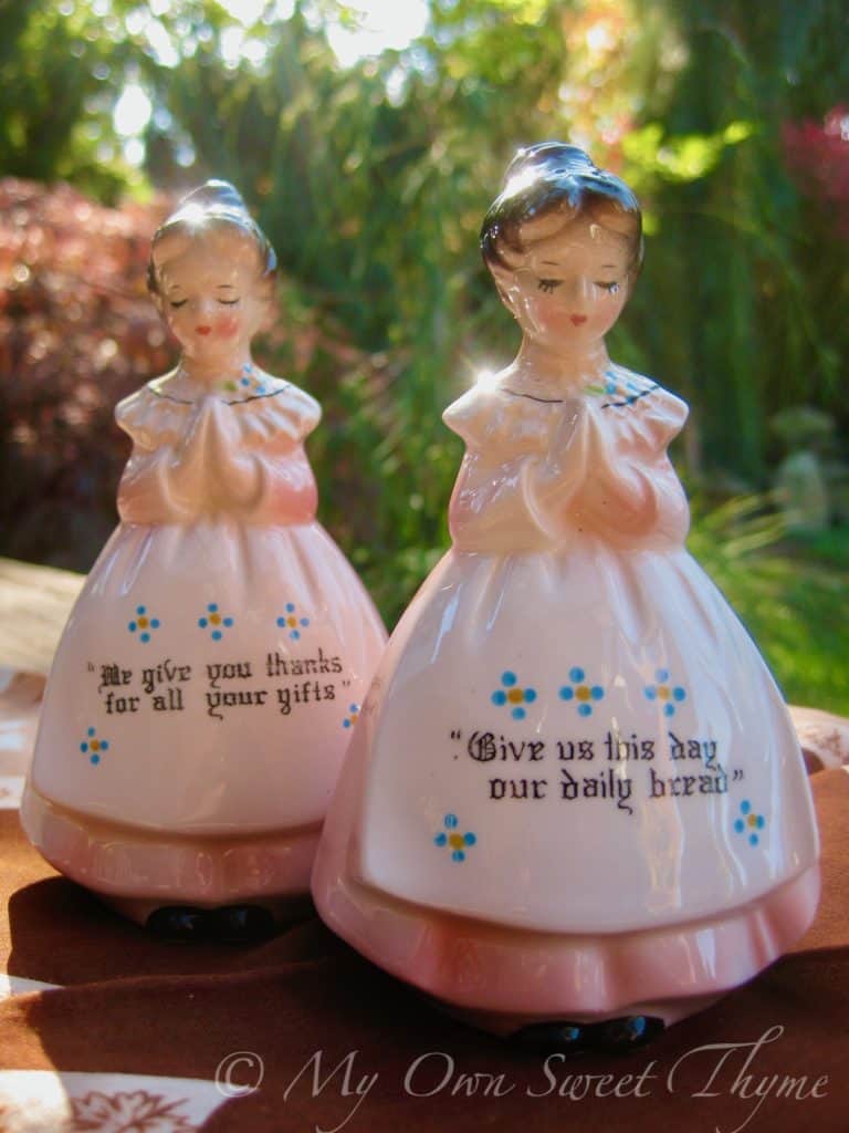 Vintage ceramic salt and pepper shakers - ladies in pristine aprons proclaiming Faith and Thankfulness with their hands folded in prayer.