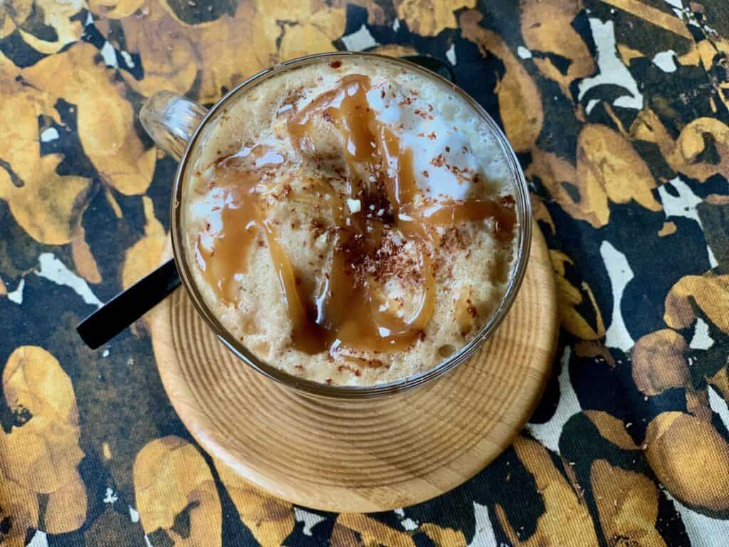 Peanut Butter Fudge Latte in a glass cup.