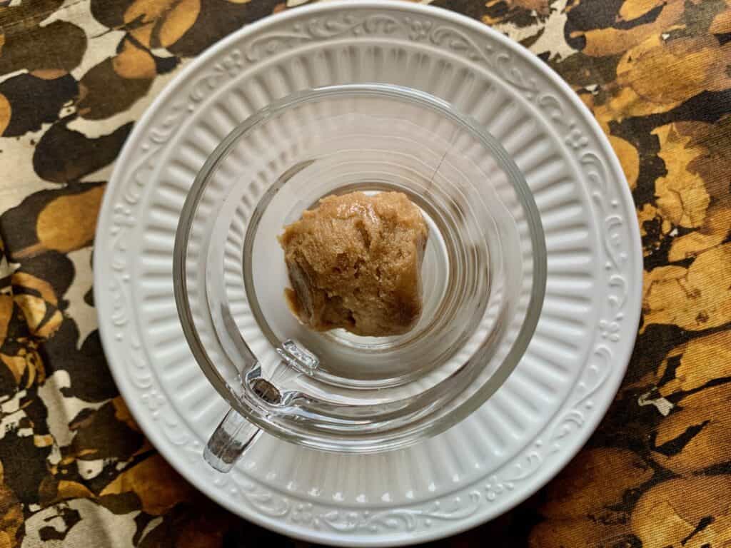 Peanut Butter Fudge in a glass cup.