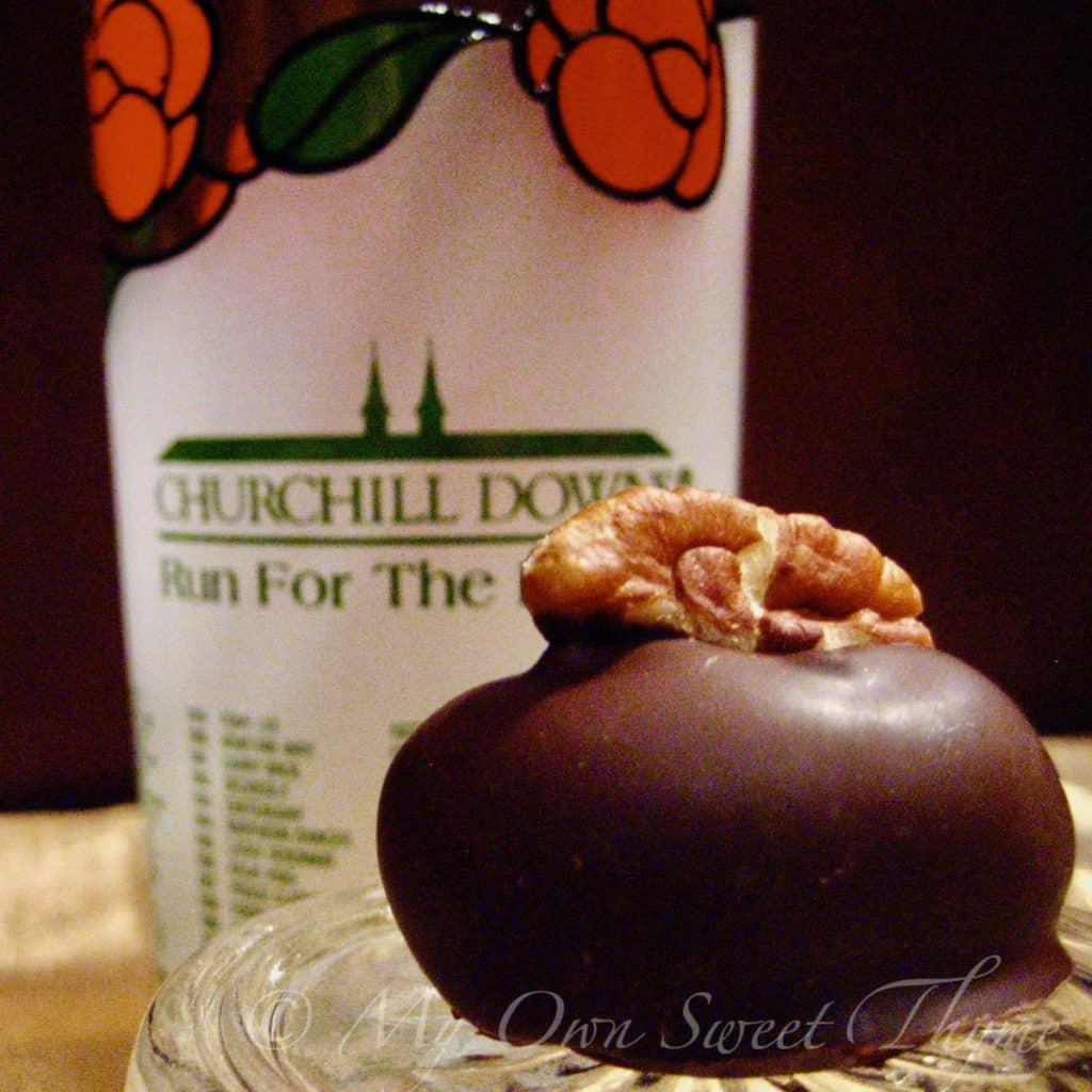 Bourbon Vanilla Truffle in front of Kentucky Derby Mint Julep Glass