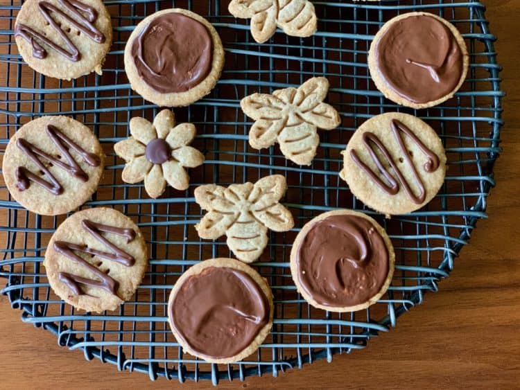 Chocolate-Covered Digestive Cookies on a black wire rack