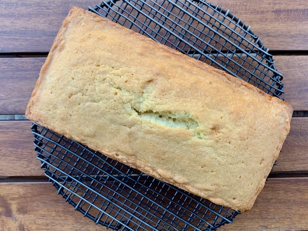 A Loaf of Old Fashioned Pound Cake cooling on a wire rack