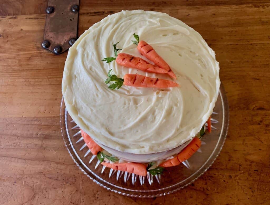 Cream Cheese Carrots adorn the top and sides of this pretty Carrot Cake made with 6-inch round layers.