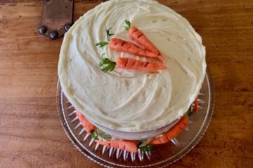 Decorative Carrots adorn the top and sides of this pretty Carrot Cake made with 6-inch round layers.