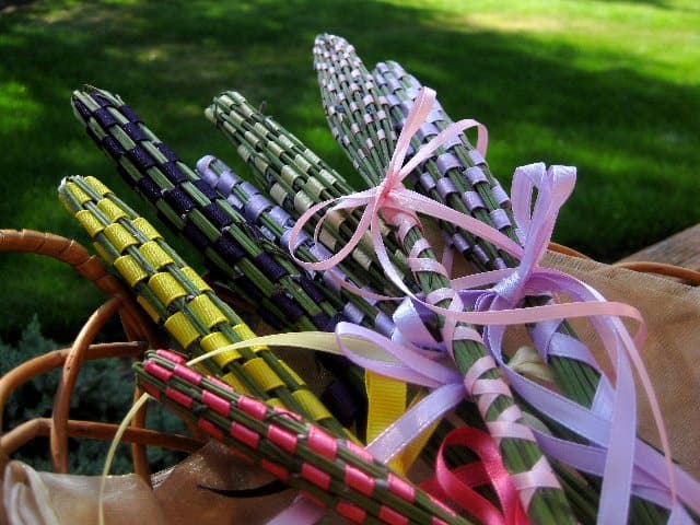 Assortment of lavender wands with different colored ribbons.