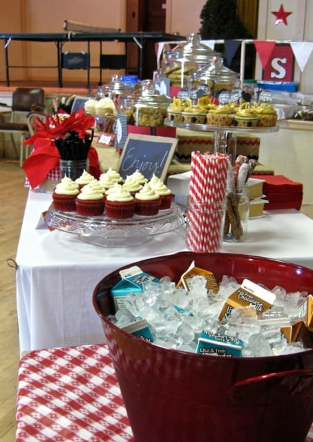 dessert table with cupcakes, milk cartons and striped paper straws